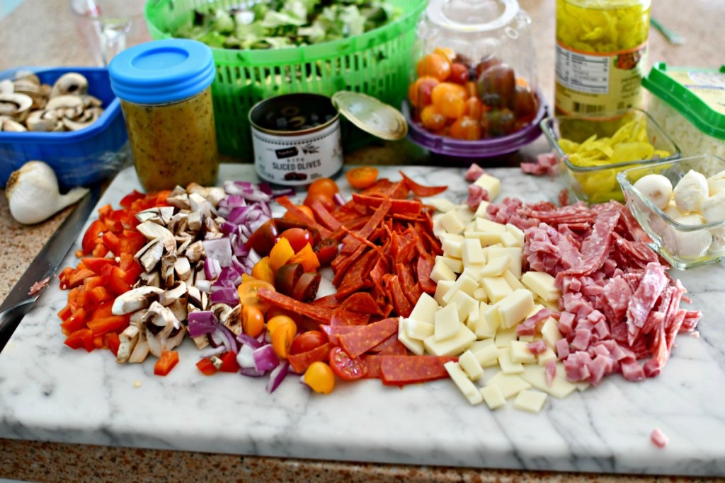 ingredients on cutting board for pizza salad