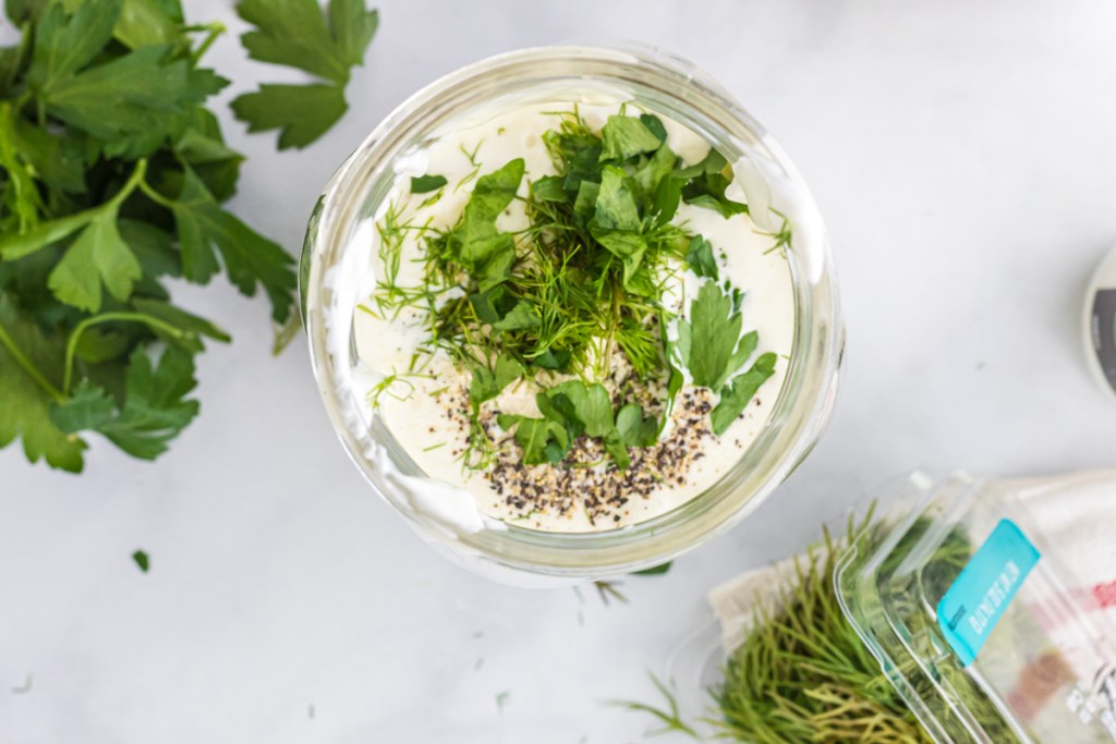 ingredients in a mason jar for ranch dressing