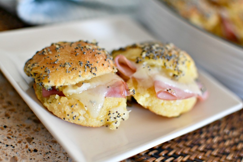 plate of ham and cheese sliders
