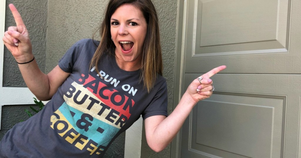 woman wearing shirt that reads i run on bacon butter and coffee