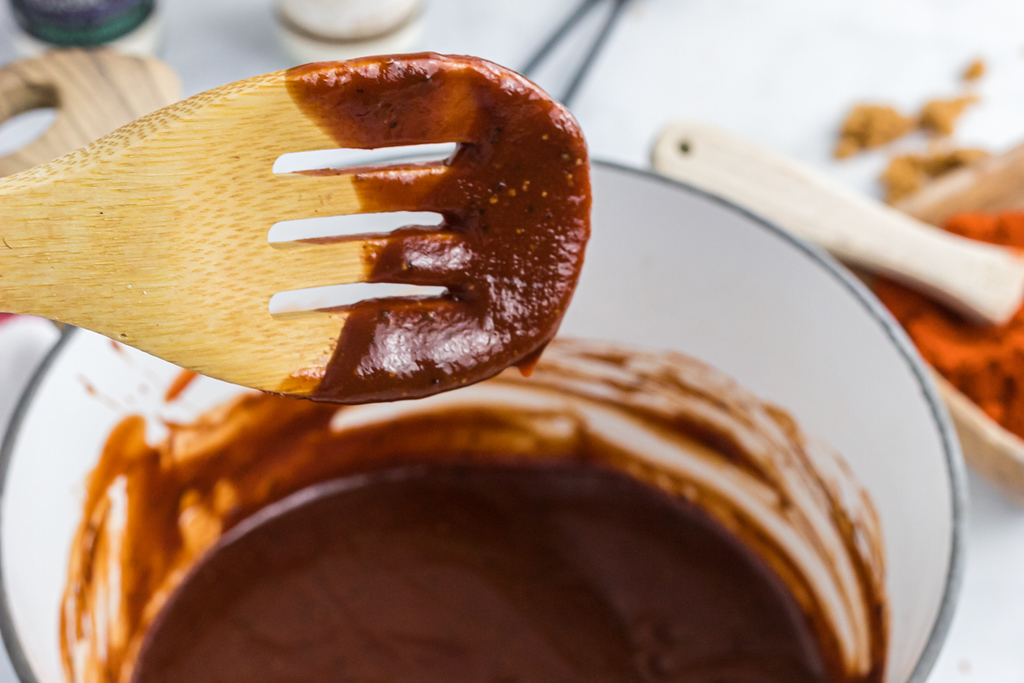 keto BBQ sauce on wooden spoon