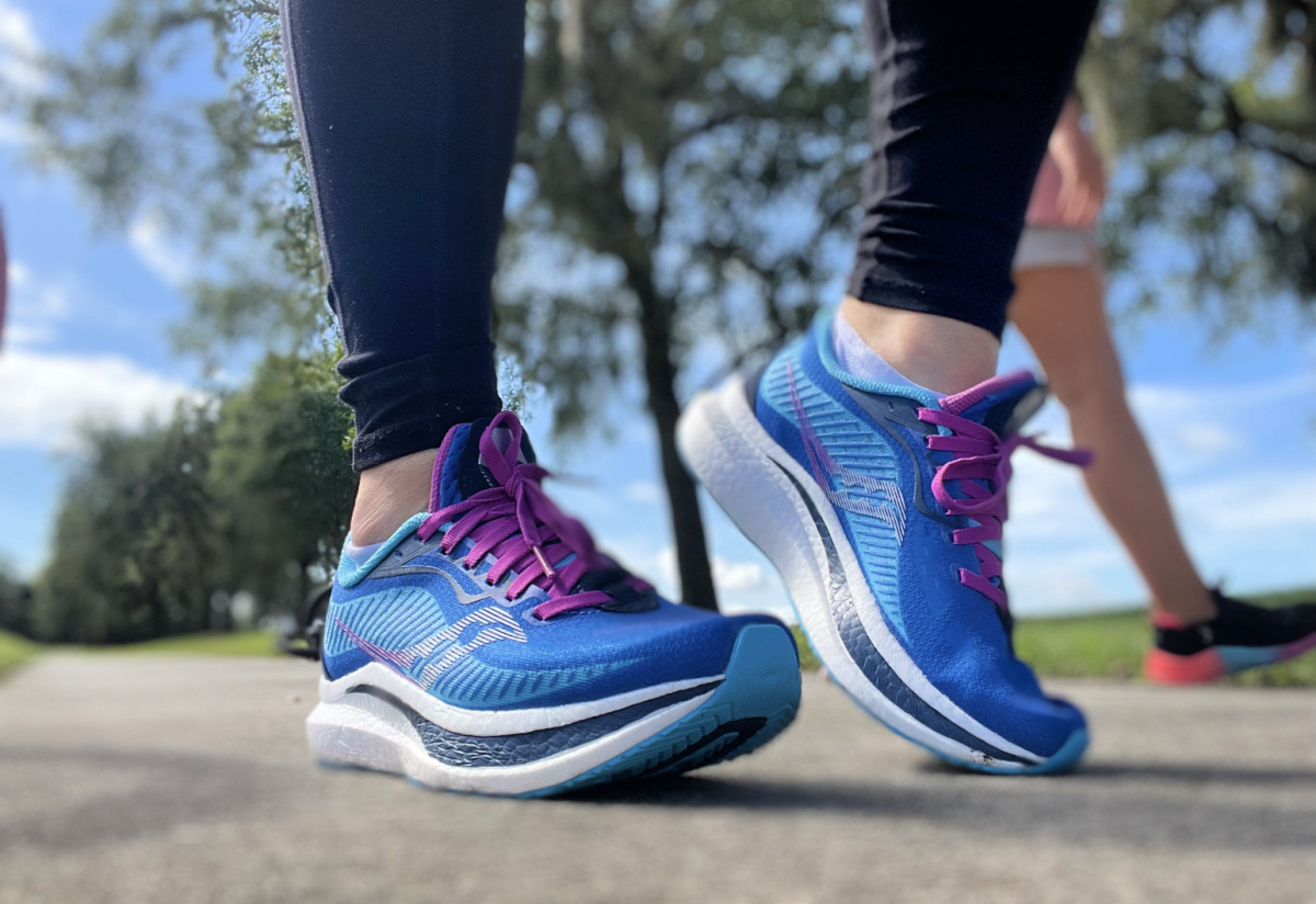 woman wearing Saucony Running Shoes during exercise activities