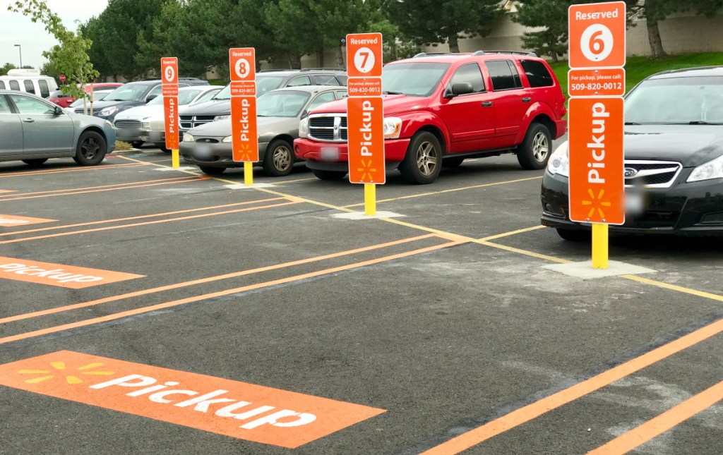 parking lot at walmart with grocery pickup spots