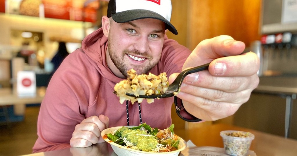 man holding fork with chipotle cauliflower rice 