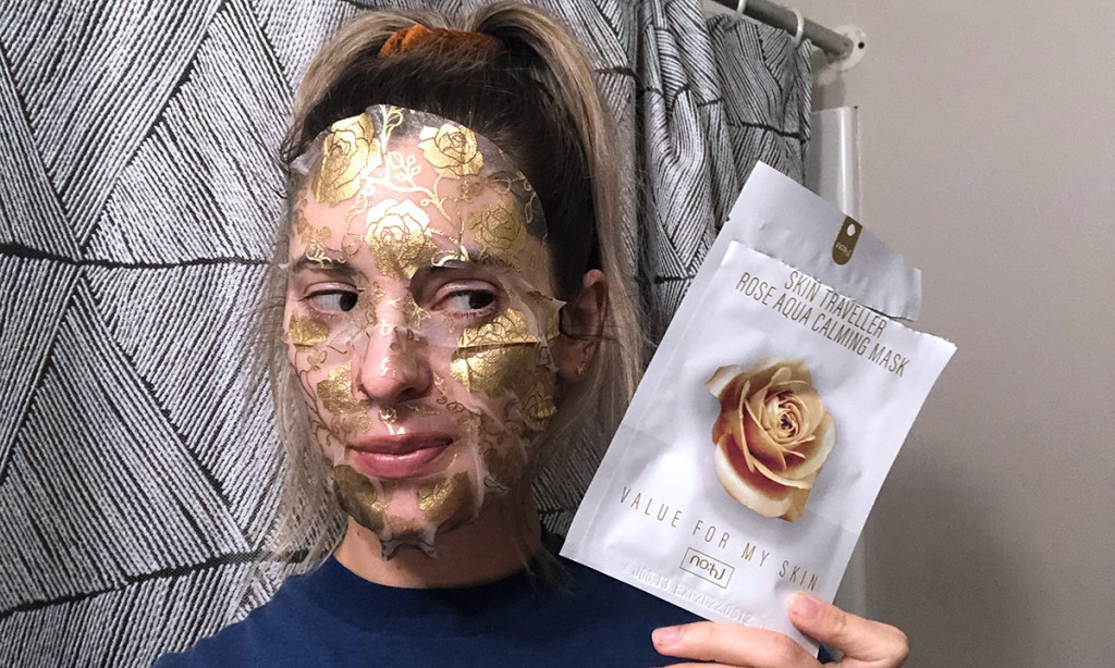 woman wearing skin care face mask