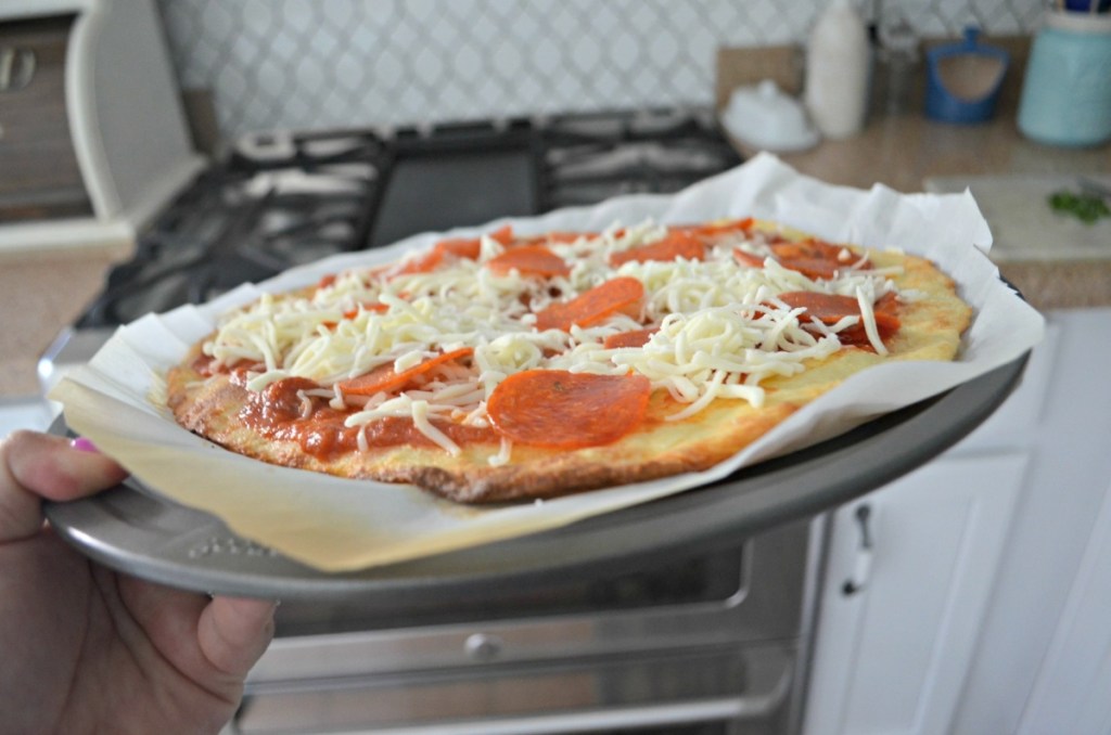 putting keto pizza into the oven