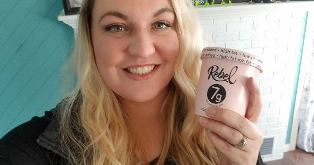 woman holding container of rebel ice cream