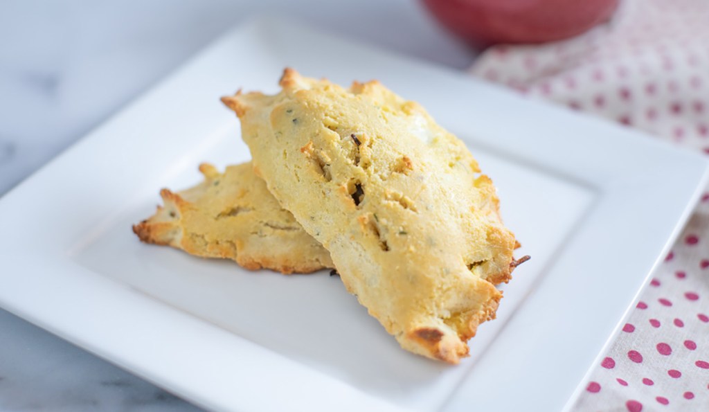 two keto empanadas on white plate