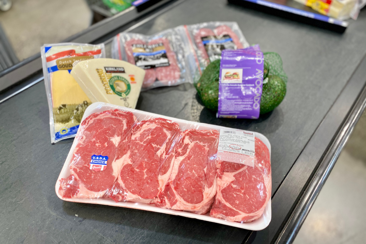 steak, cheese, avocado, and other keto shopping list items on counter