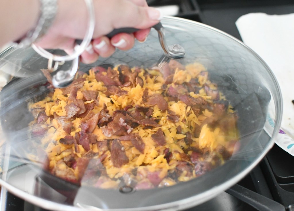 lid over the skillet of radishes to melt cheese