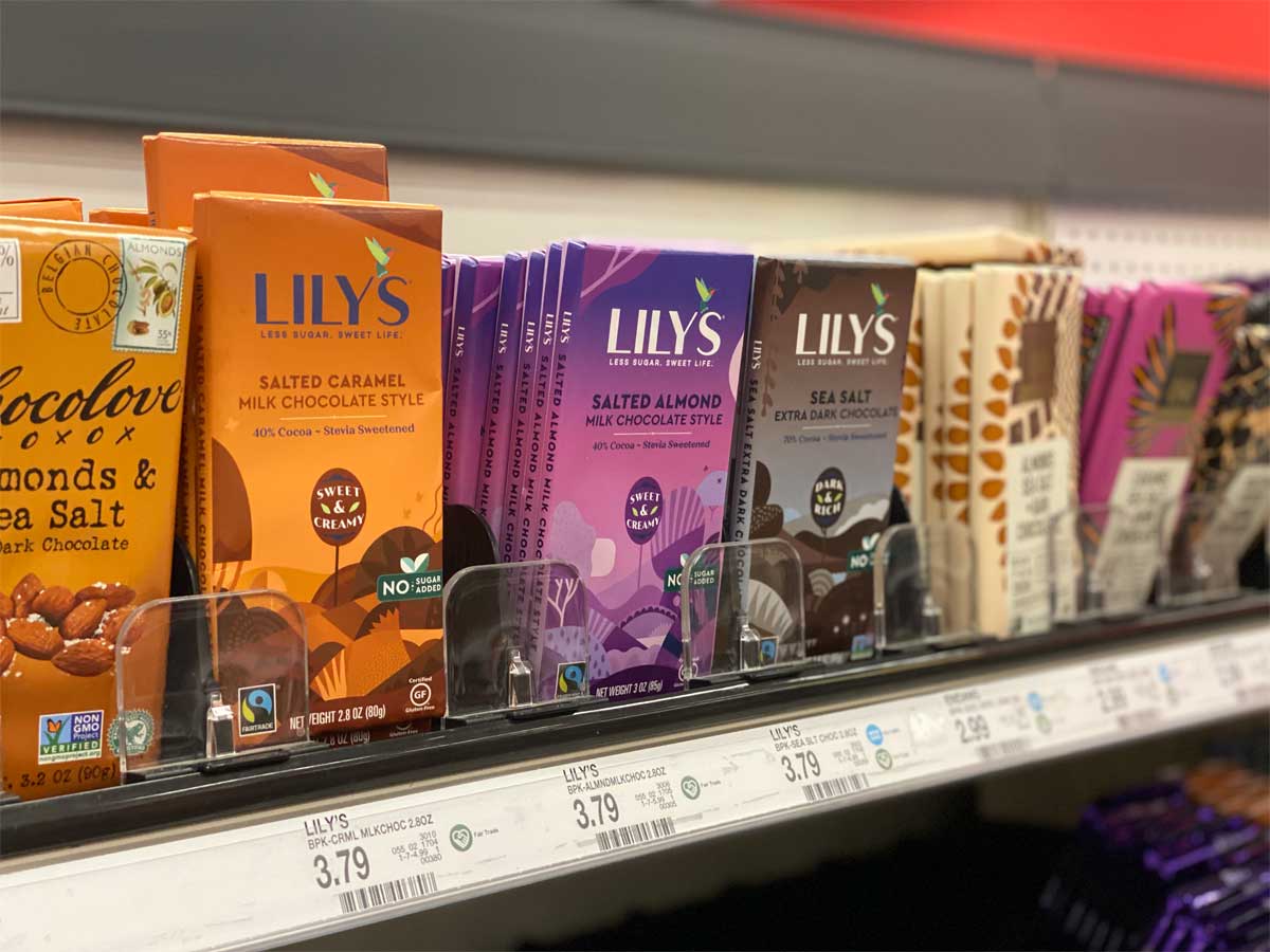 lily chocolate bars on display on a shelf in a store