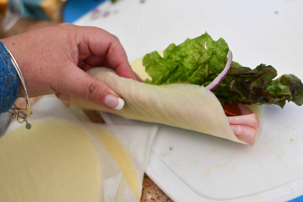 wrapping folios cheese wrap with meat and lettuce 