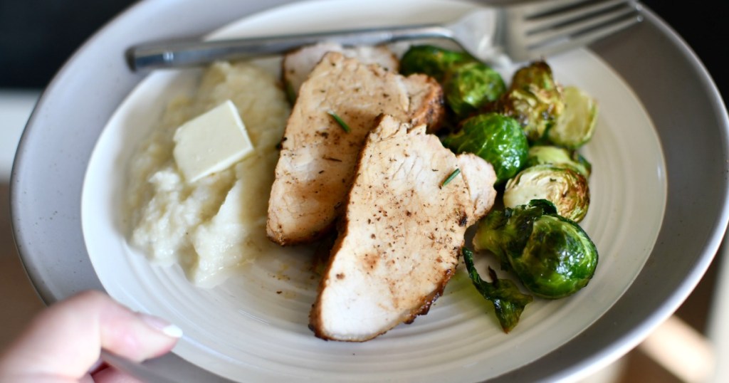 plate of pork tenderloin and veggies