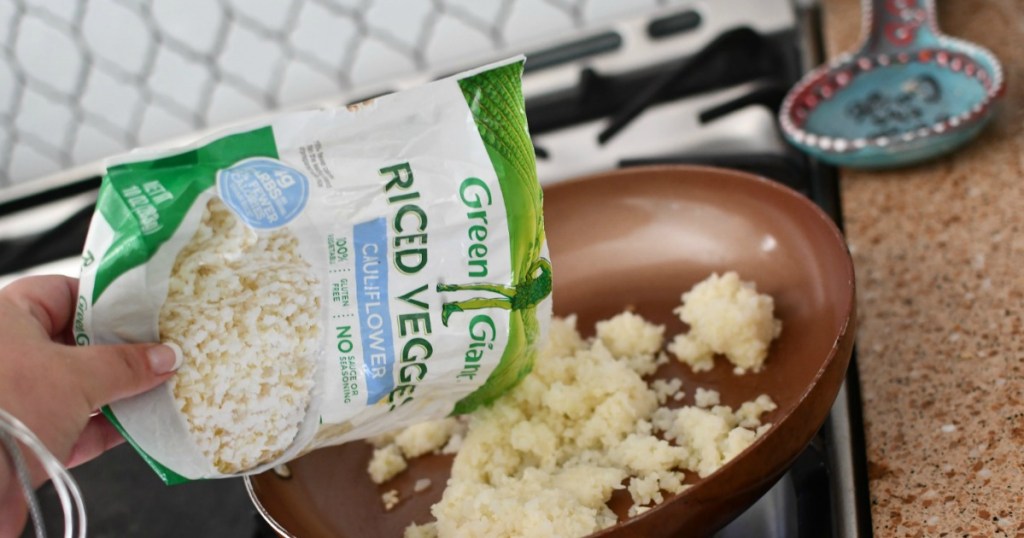 putting Green Giant frozen cauliflower rice in skillet 