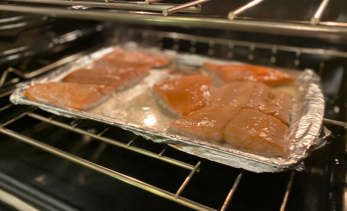 salmon cooking in oven