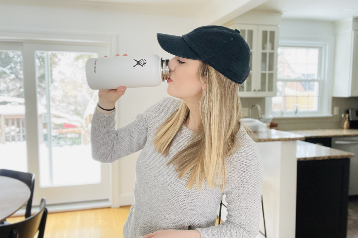 Woman drinking from Hydro Flask