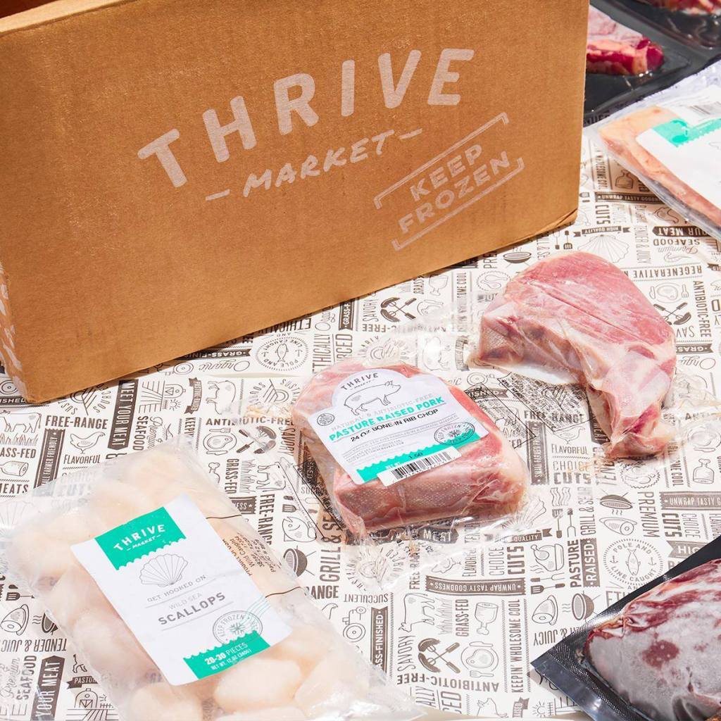 Thrive Market box with frozen fish on counter