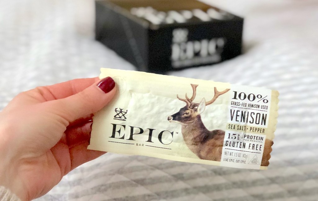 hand holding a venison epic protein bar