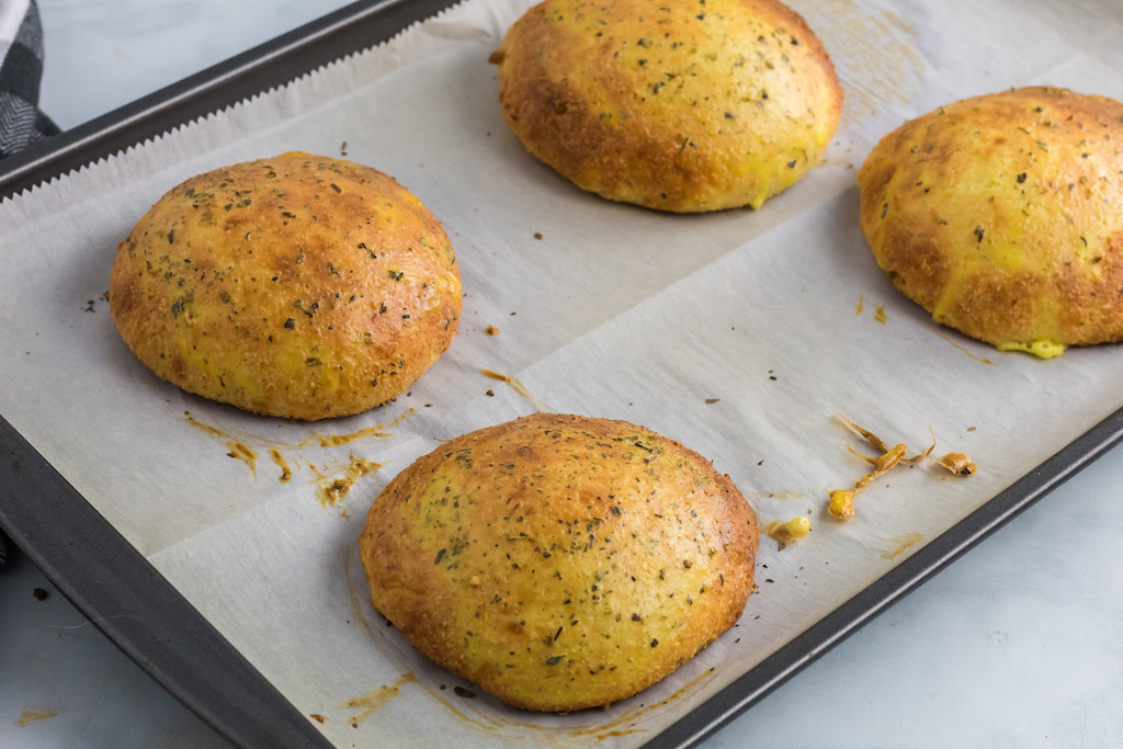 baked keto buns on parchment paper