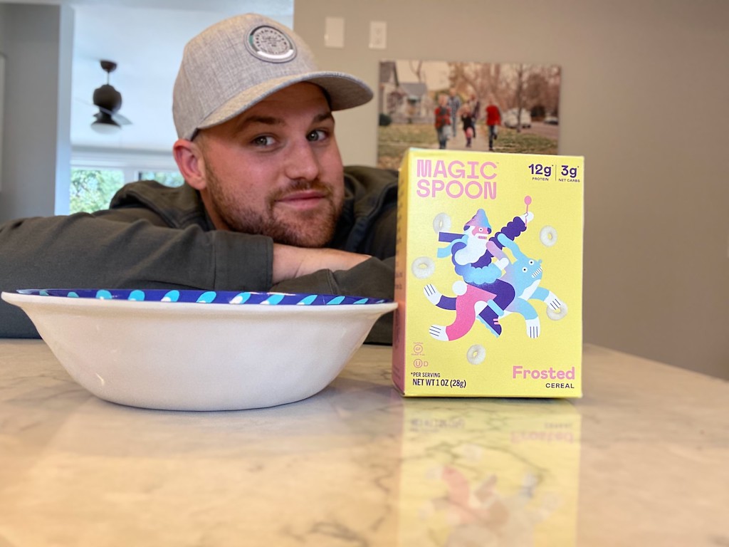 Man by bowl with Magic Spoon cereal on counter 
