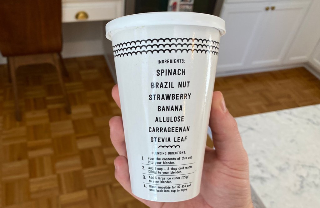 hand holding catalina crunch keto smoothie