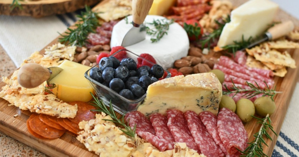 keto meat and cheese board with berries and nuts 