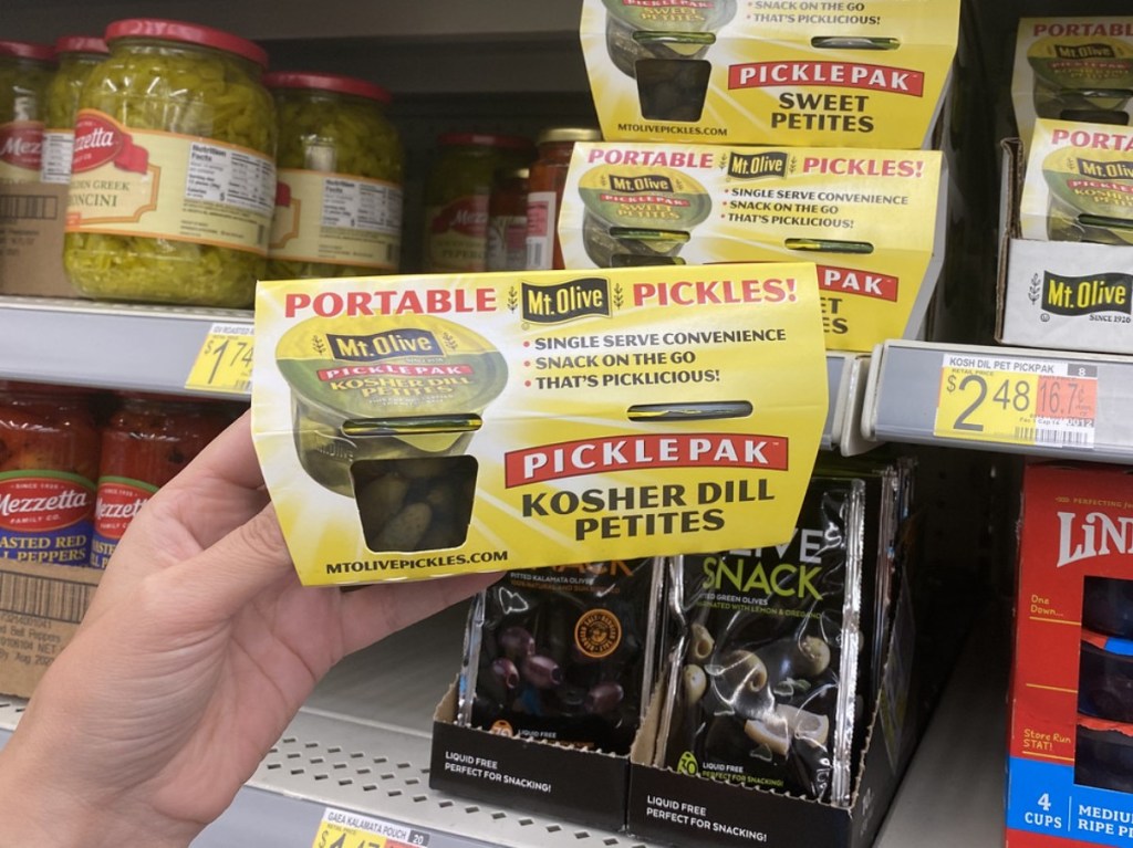 holding Mt. Olive Portable Pickle Paks