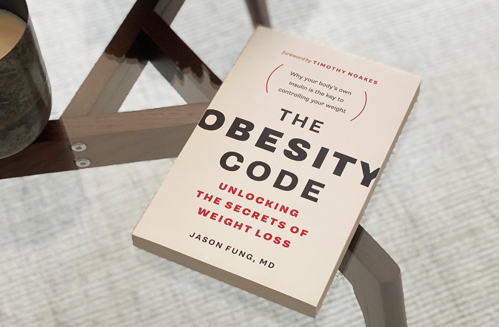 obesity code book on table