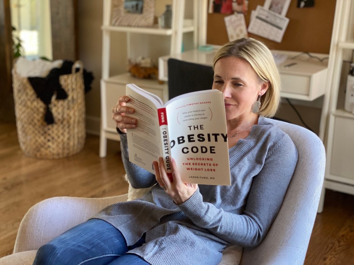 woman reading book