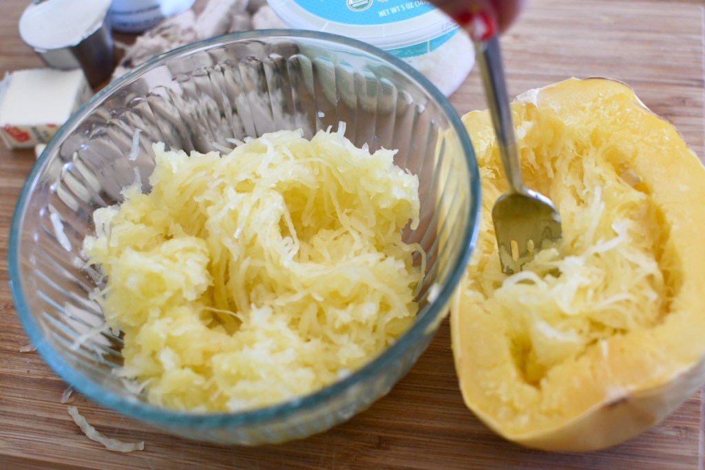 scraping out spaghetti squash