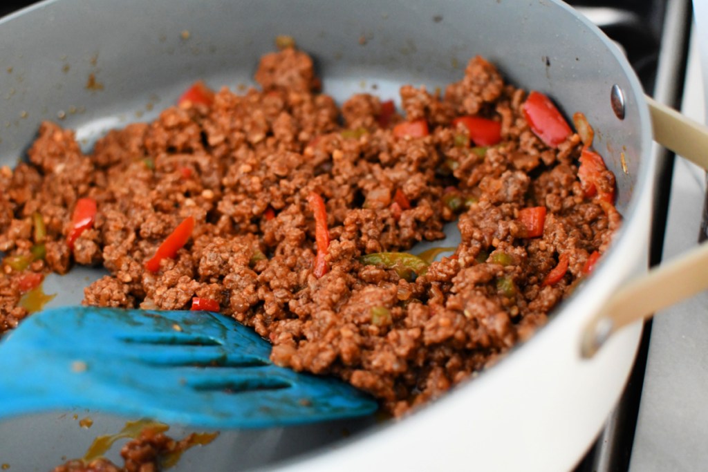 A skillet with keto sloppy joes after cooking.