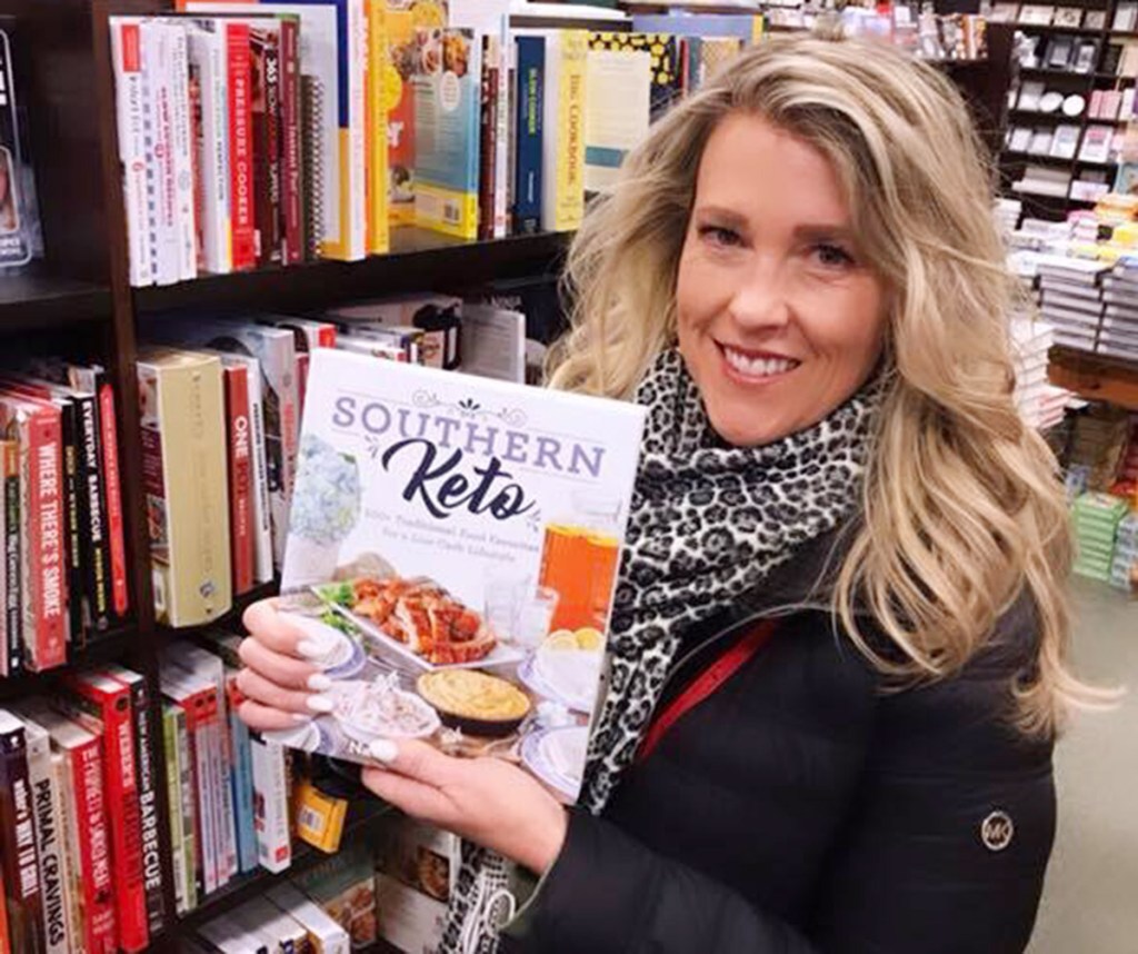 woman holding book