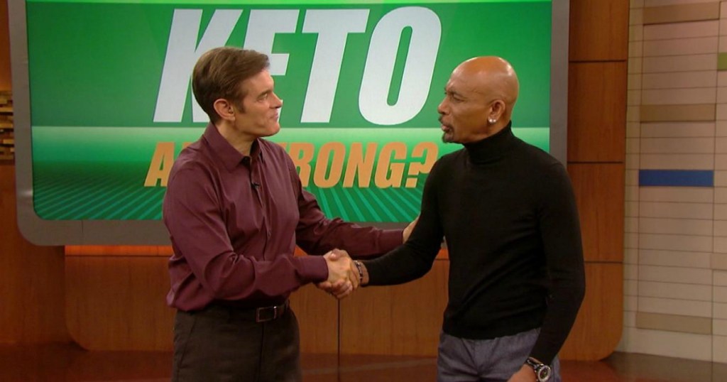 Montel Williams shaking hands with Doctor Oz