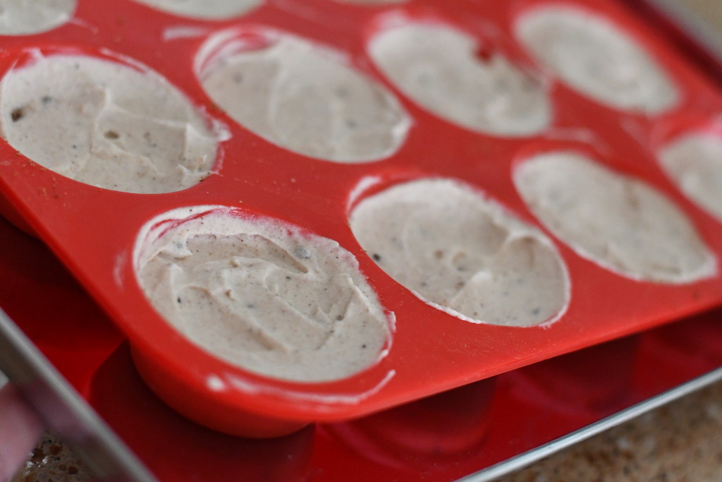 silicone muffin tins filled with cookies & cream filling 