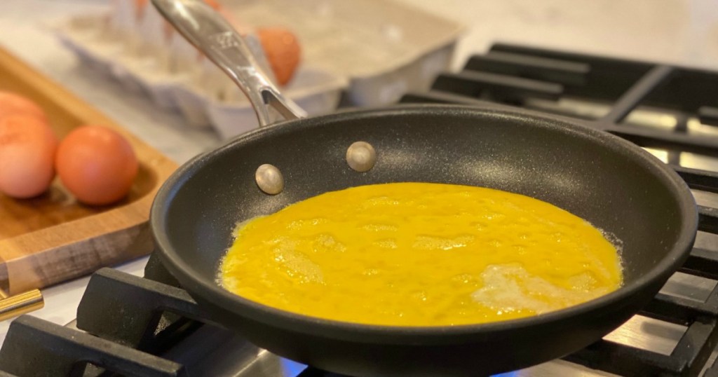 cooking scrambled eggs in pan
