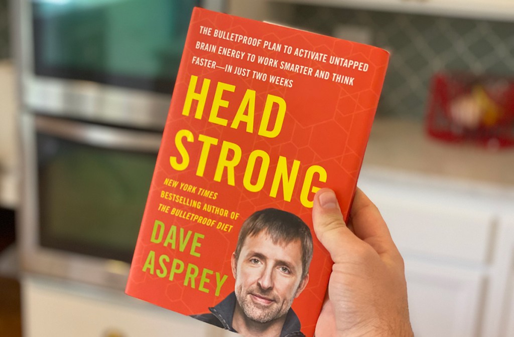 head strong book in hand