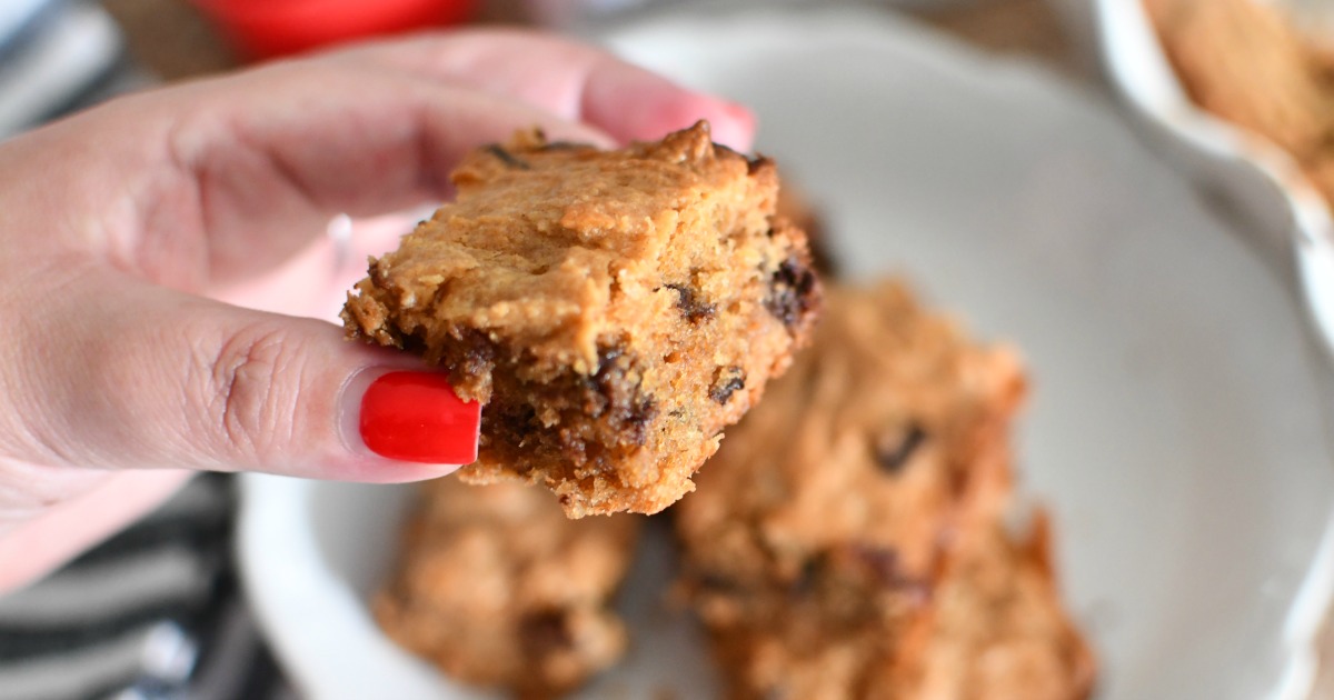 holding a peanut butter cookie bar