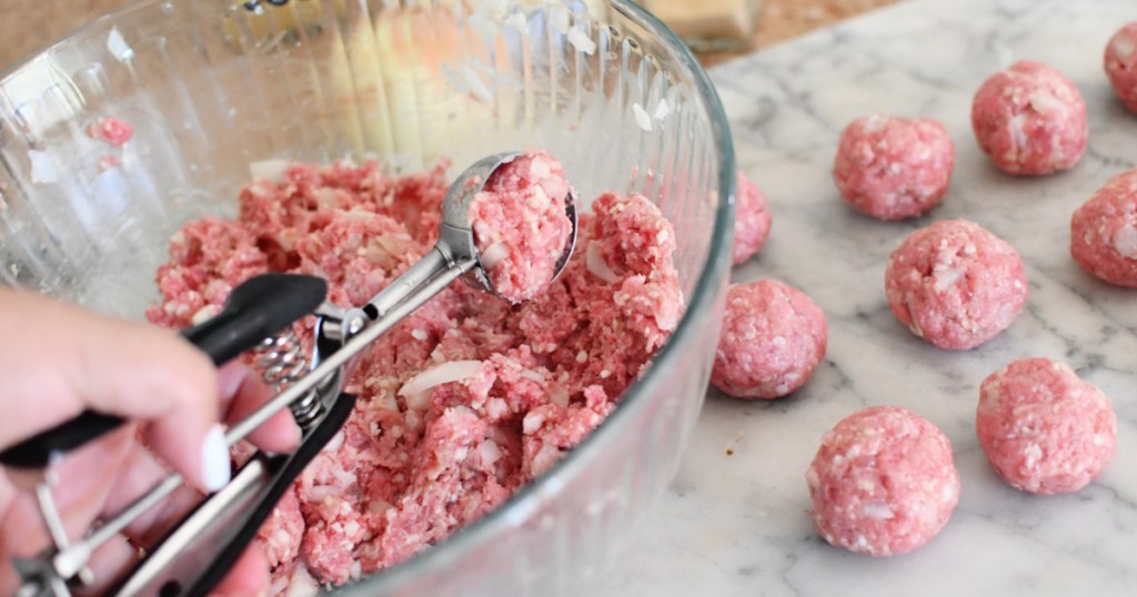 using cookie scoop to make meatballs