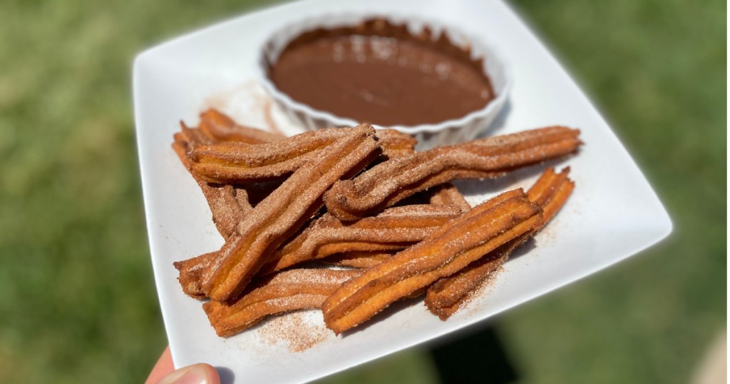 keto churros on a plate with chocolate