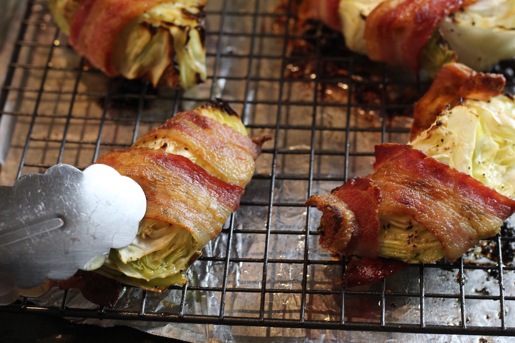 bacon wrapped cabbage on pan 