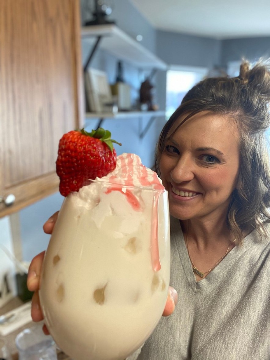 holding keto strawberry milk