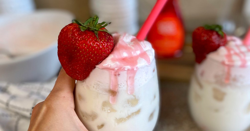 hand holding keto whipped strawberry milk