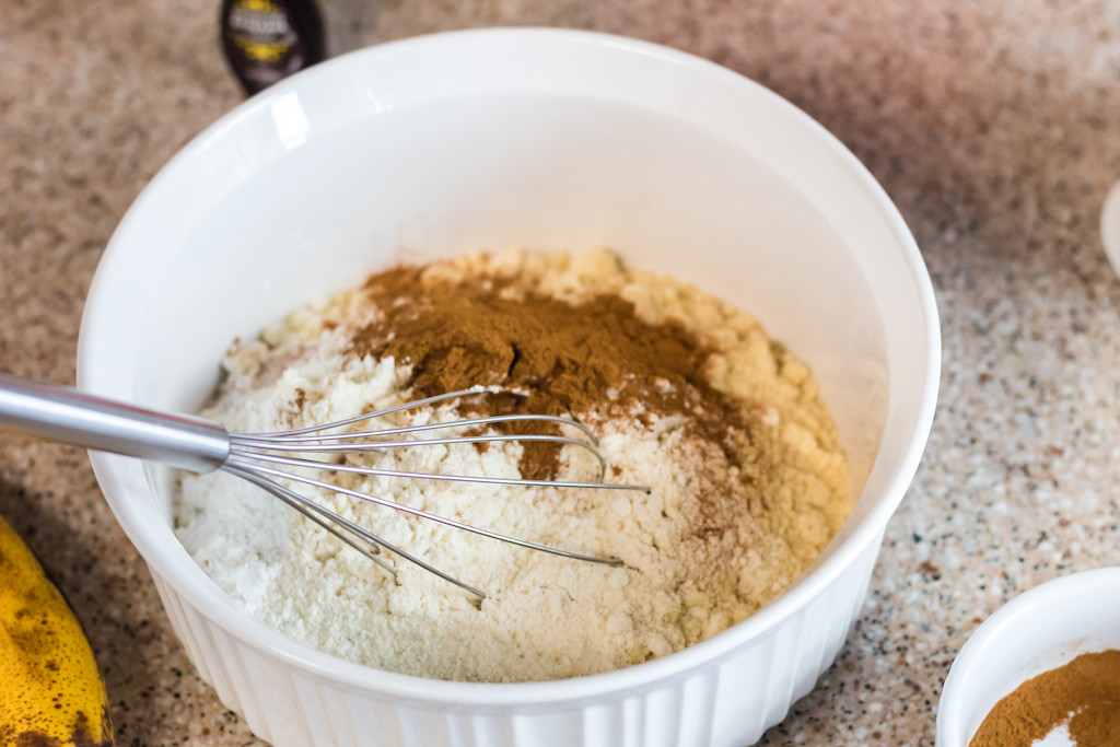 mixing dry ingredients together for banana bread 