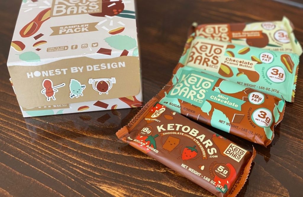 Keto snack bars on a table next to the box