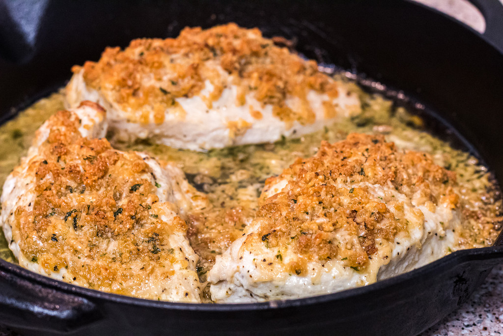 keto parmesan crusted chicken in pan 