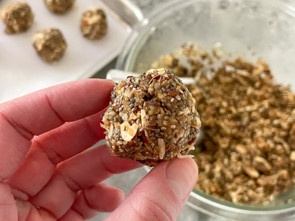 holding a keto protein ball