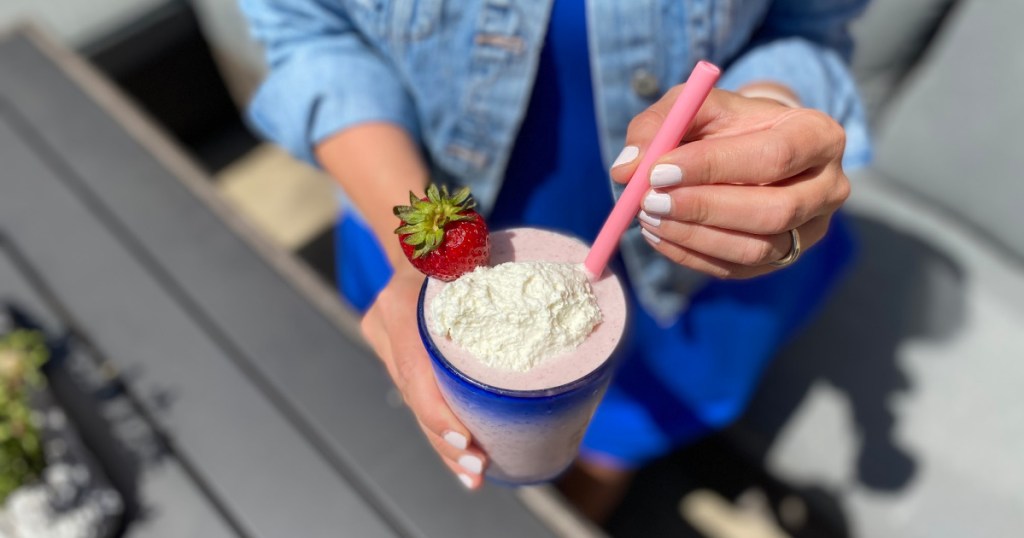 Girl holding Keto Smoothie