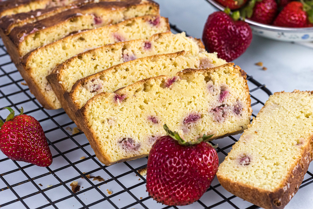 sliced keto strawberry shortcake bread with fresh strawberries