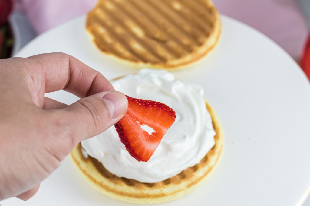 sliced strawberries added to chaffle