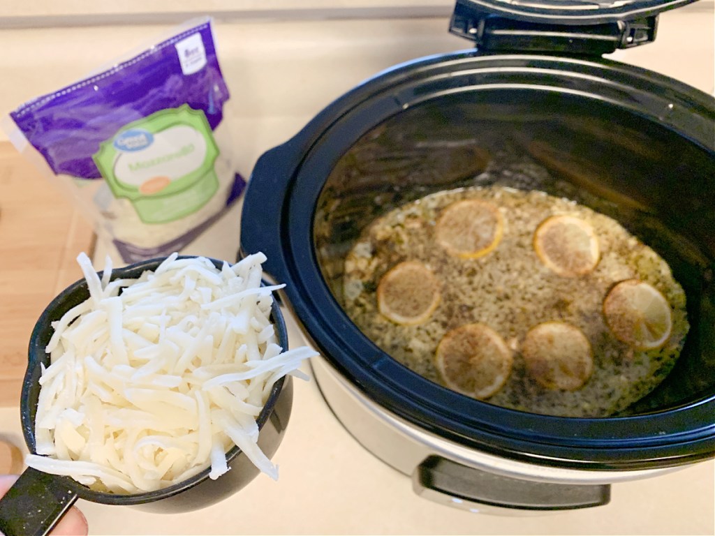 adding mozzarella to lemon pesto chicken